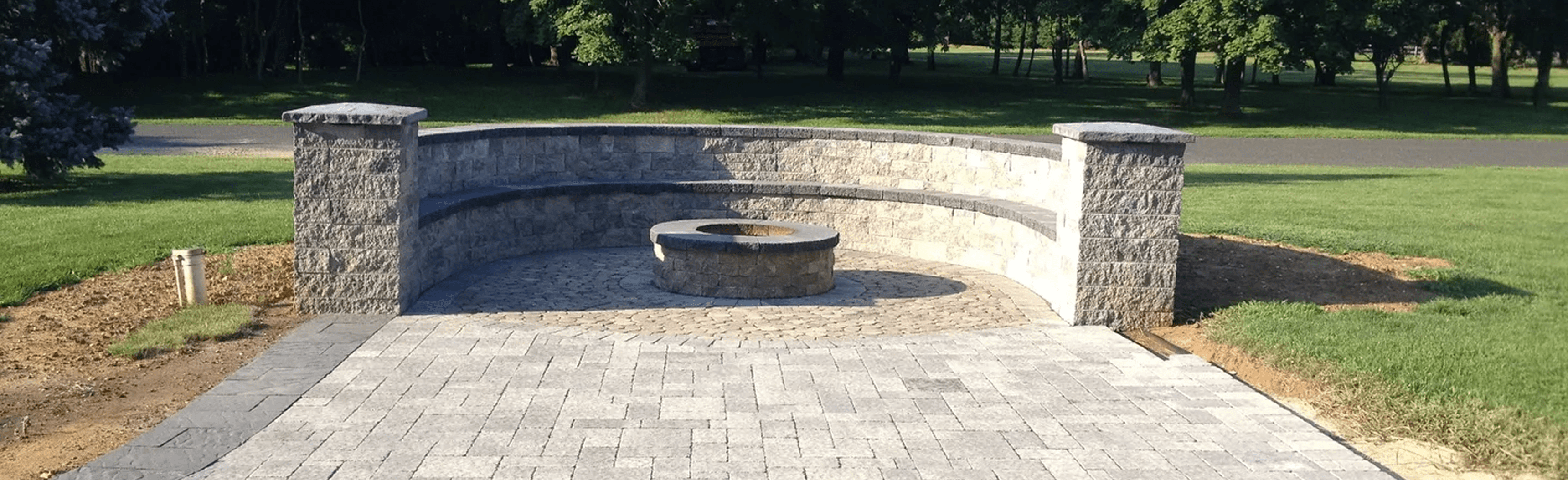 Outdoor patio with stone fire feature